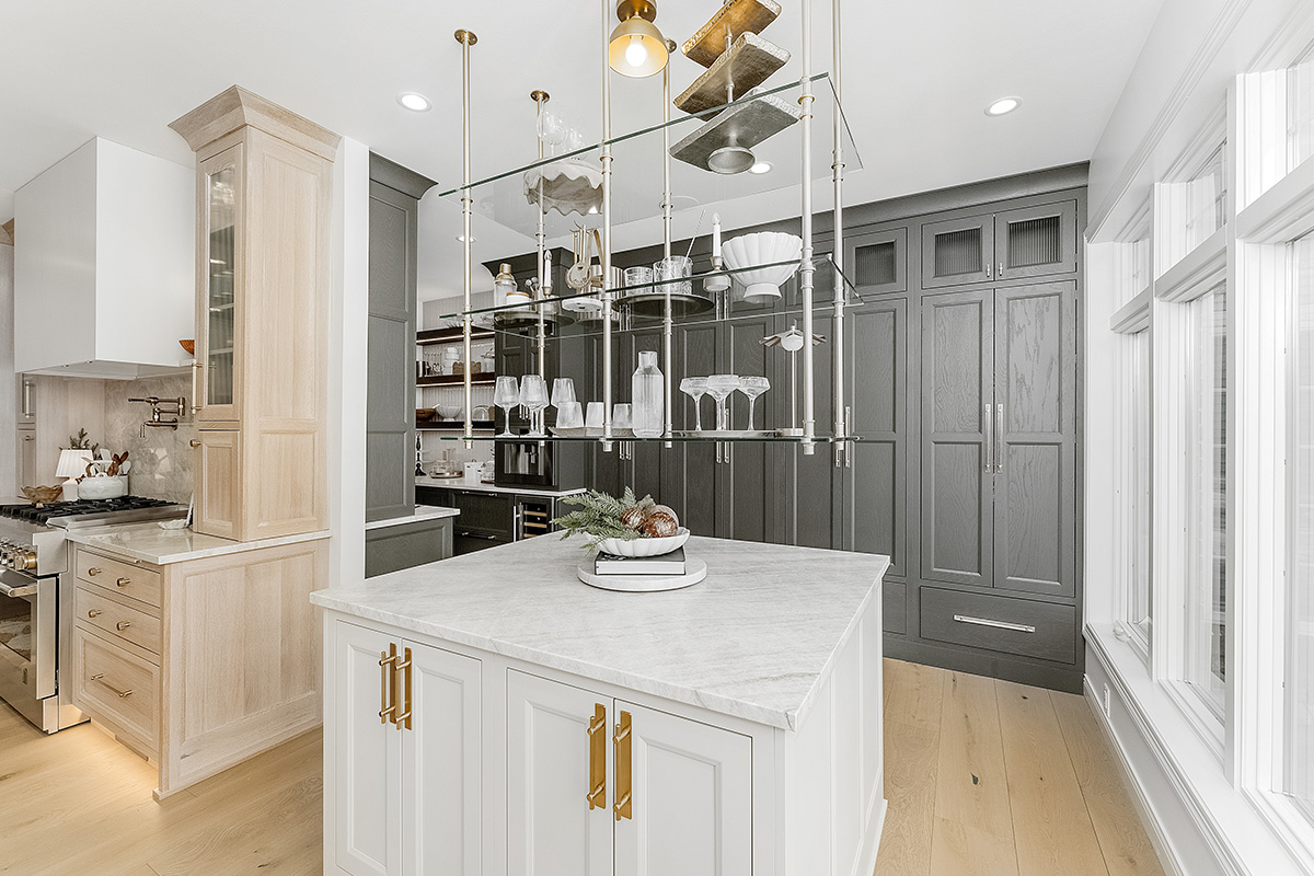 Painted tall cabinets with bar island