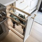 Pull out utensil storage cabinet