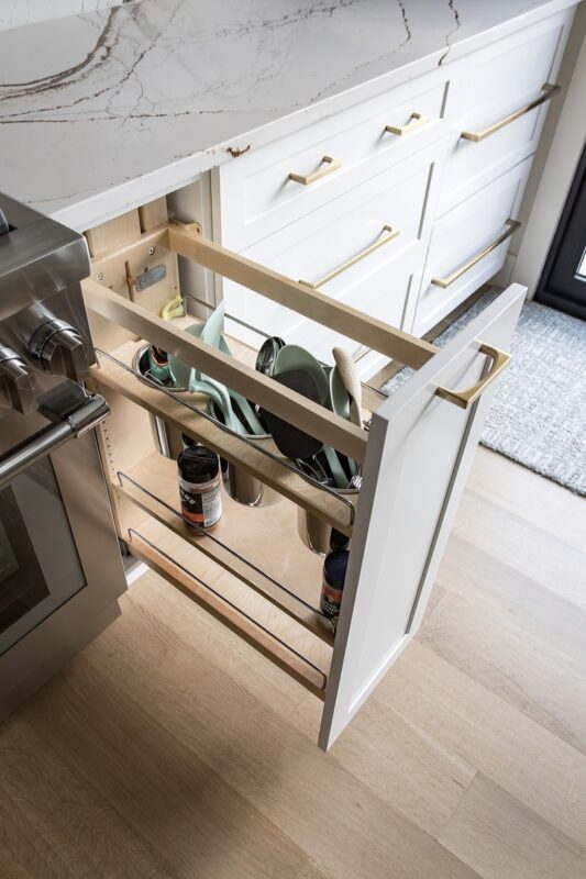 Pull out utensil storage cabinet
