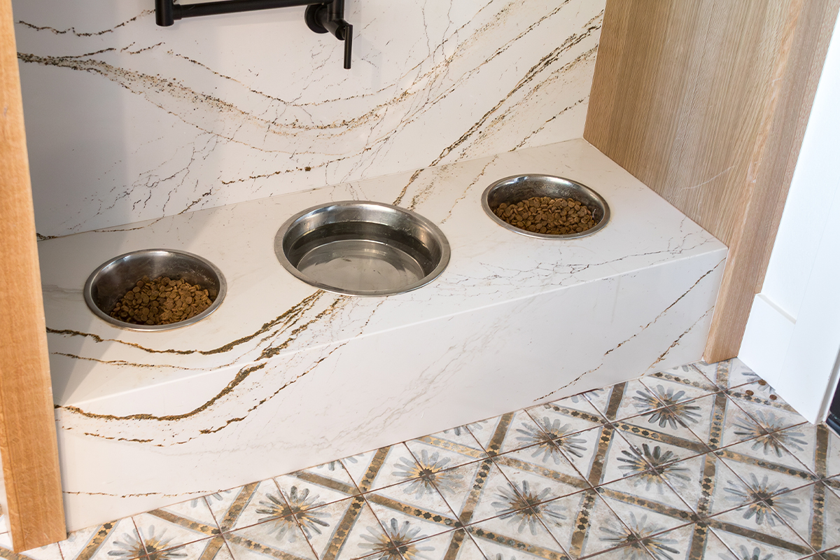 Custom dog bowls in a cabinet