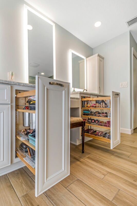 Painted master bath cabinets with pullout storage