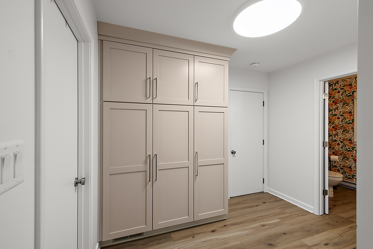 Light Mocha painted kitchen pantry cabinets.