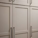 Light Mocha painted kitchen pantry cabinets.