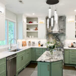 Painted kitchen cabinets in green bases and white wall cabinets