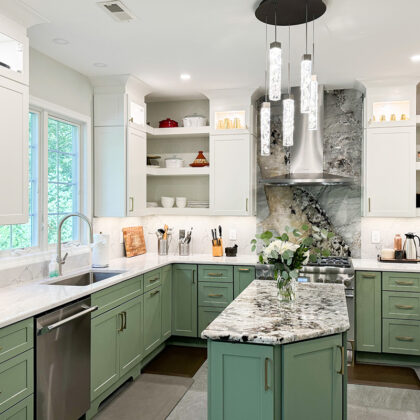 Painted kitchen cabinets in green bases and white wall cabinets
