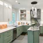 Painted kitchen cabinets in green bases and white wall cabinets