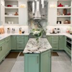 Painted kitchen cabinets in green bases and white wall cabinets