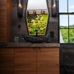 Contemporary bathroom with stained slab door vanity