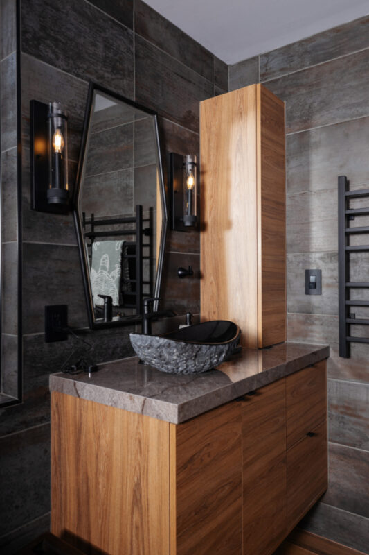Contemporary bathroom with stained slab door vanity