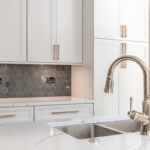 White painted kitchen perimeter cabinets