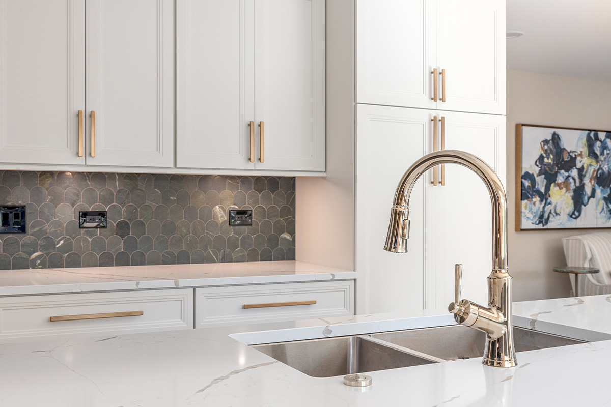 White painted kitchen perimeter cabinets