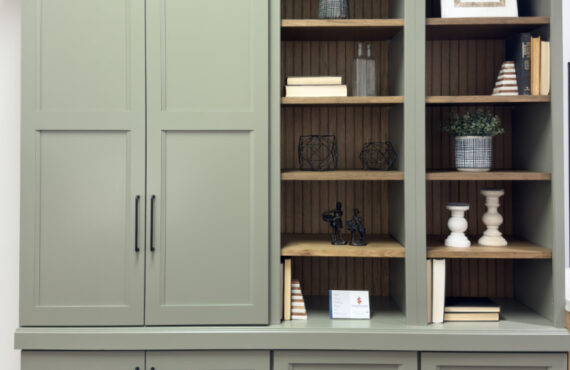 Showroom home library display featuring the Wren door painted with Moss Green.