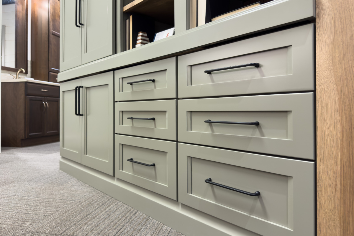 Showroom home library display featuring the Wren door painted with Moss Green.