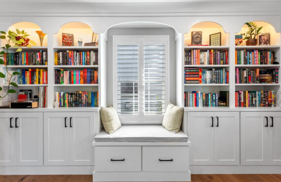 Reading nook with bench seat and bookcases on each side.