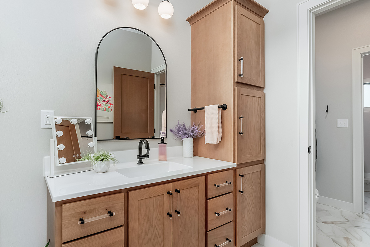 Stained single sink bathroom vanity
