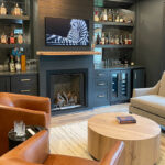 Living space with bar and fireplace.