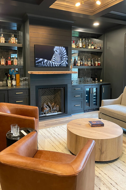 Living space with bar and fireplace.