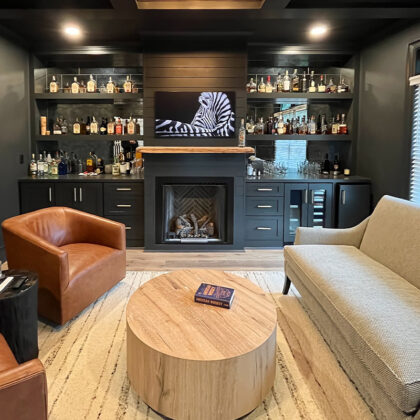 Living space with bar and fireplace.