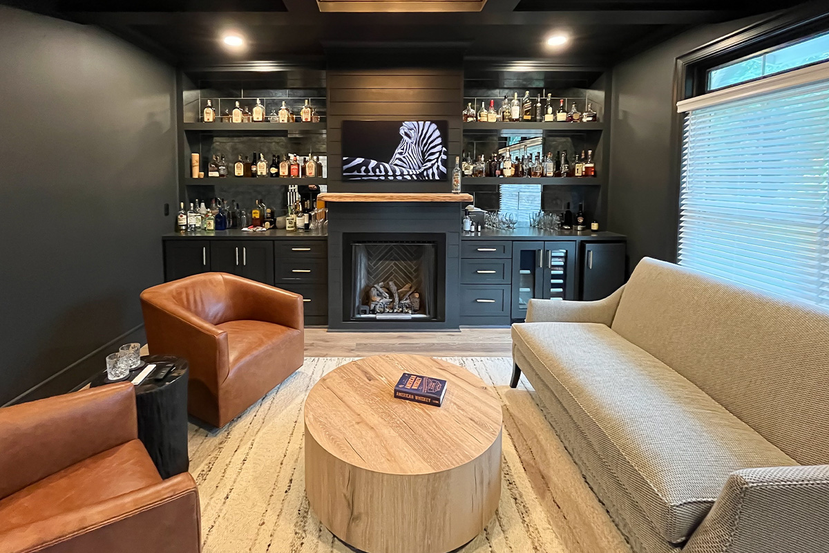 Living space with bar and fireplace.