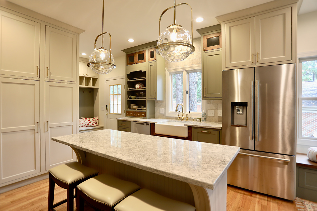 Painted cream kitchen cabinets.