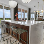 Mid-century modern kitchen in walnut natural cabinetry.