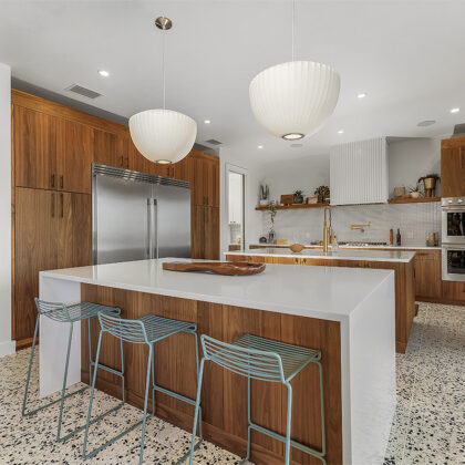 Mid-century modern kitchen in walnut natural cabinetry.