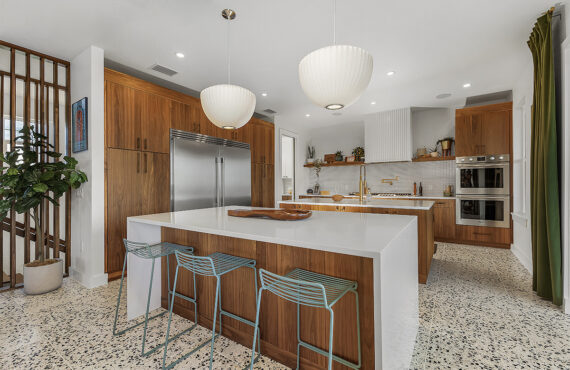 Mid-century modern kitchen in walnut natural cabinetry.