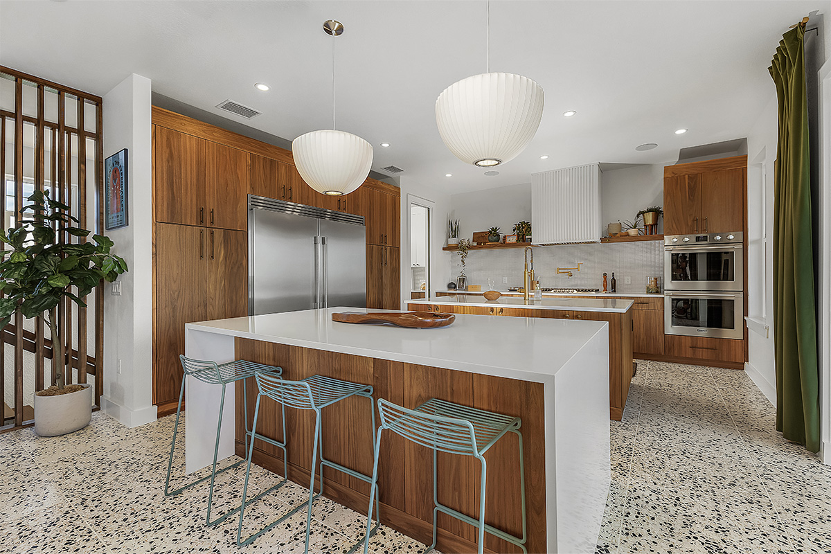 Mid-century modern kitchen in walnut natural cabinetry.
