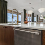 Mid-century modern kitchen in walnut natural cabinetry.