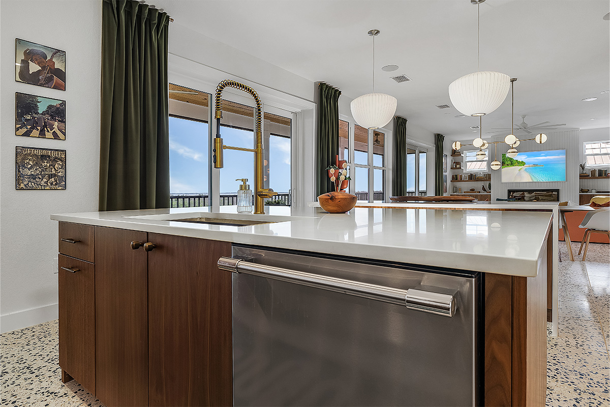 Mid-century modern kitchen in walnut natural cabinetry.