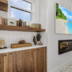 Living room space with walnut natural cabinets