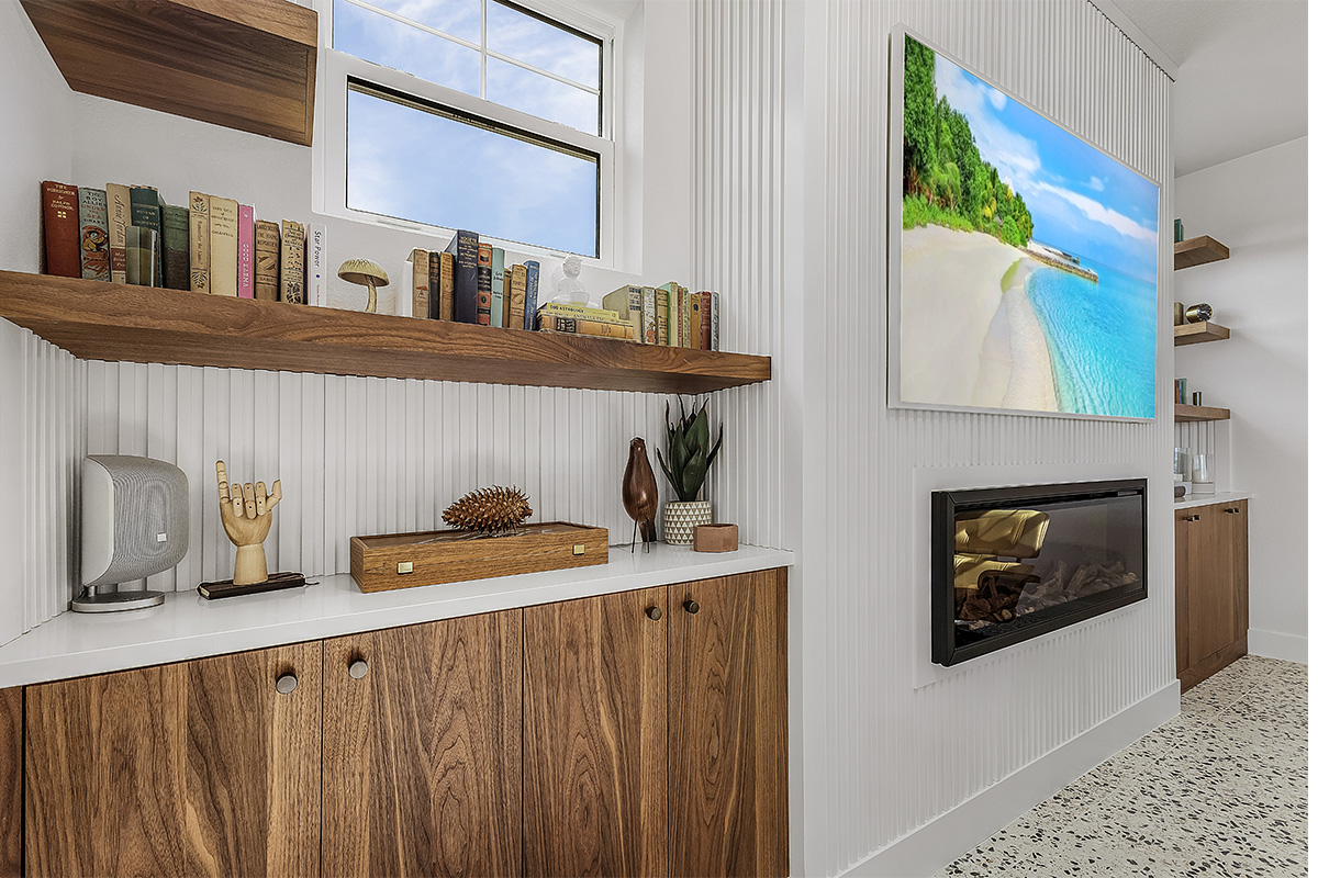 Living room space with walnut natural cabinets