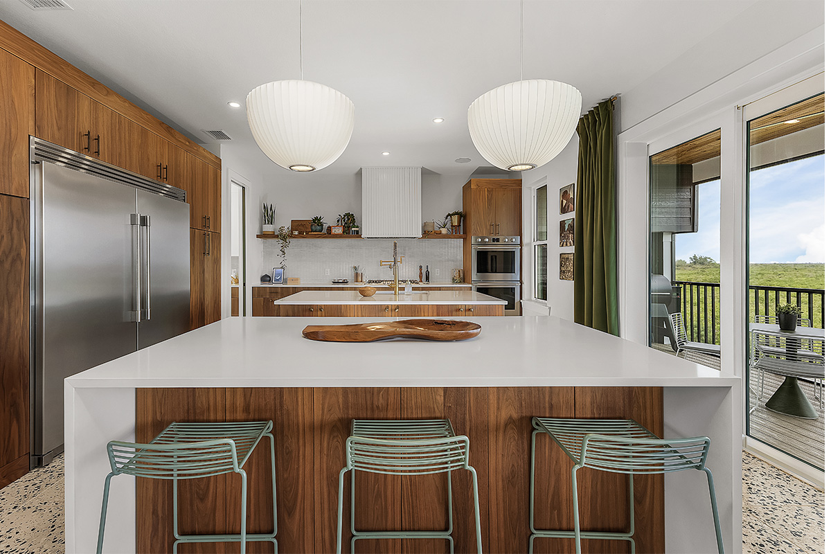 Mid-century modern kitchen in walnut natural cabinetry.