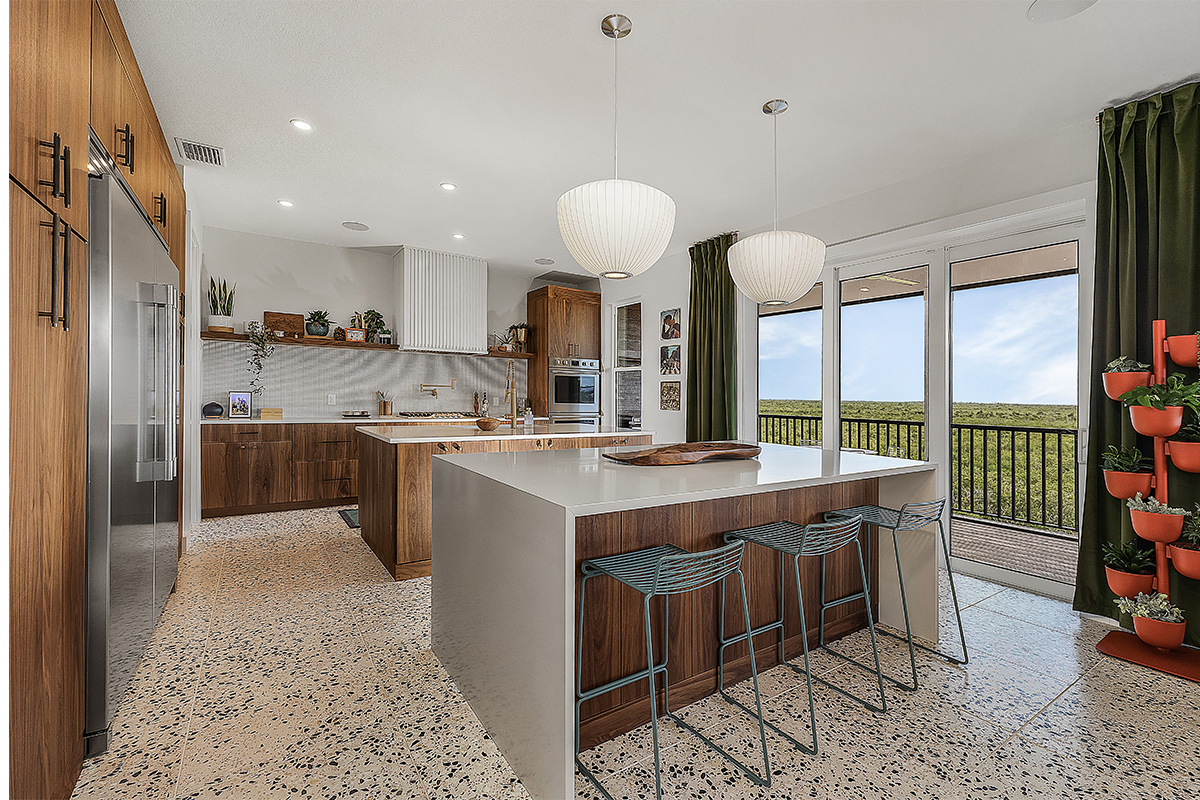 Mid-century modern kitchen in walnut natural cabinetry.