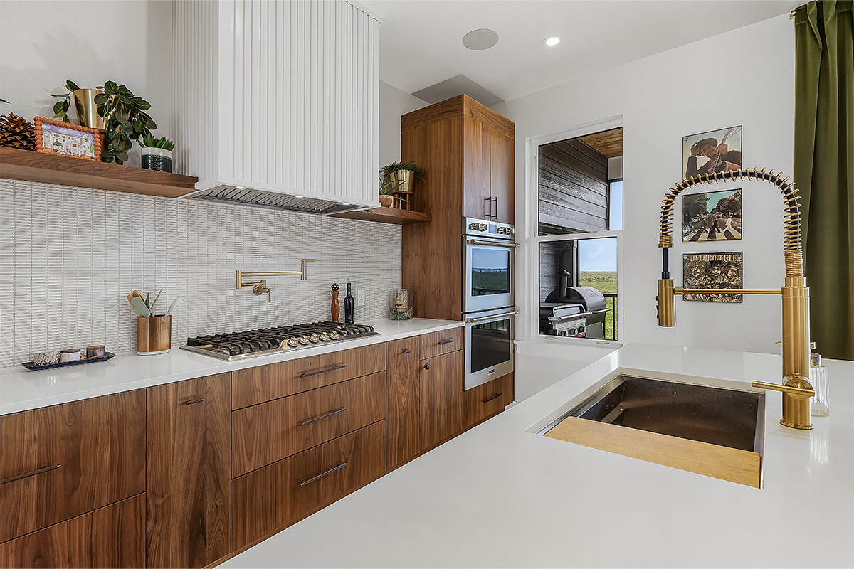 Mid-century modern kitchen in walnut natural cabinetry.