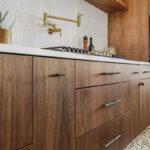 Mid-century modern kitchen in walnut natural cabinetry.