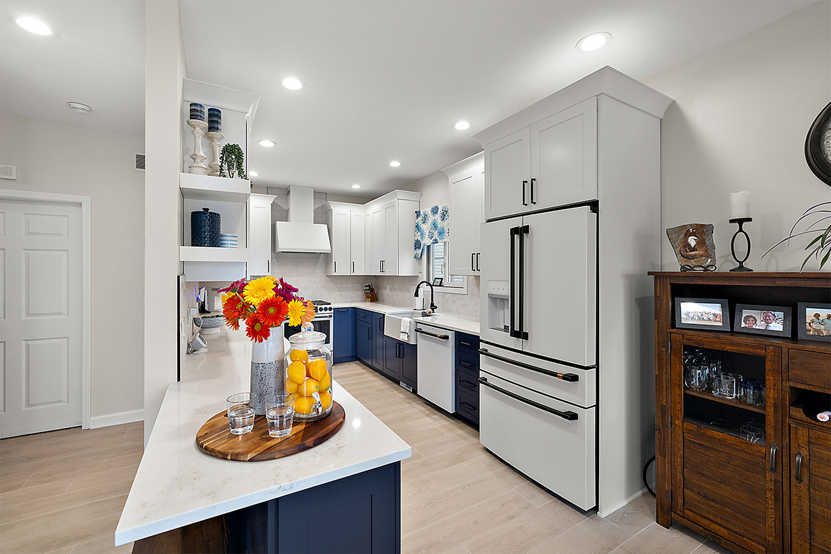 Blue and white painted kitchen cabinets
