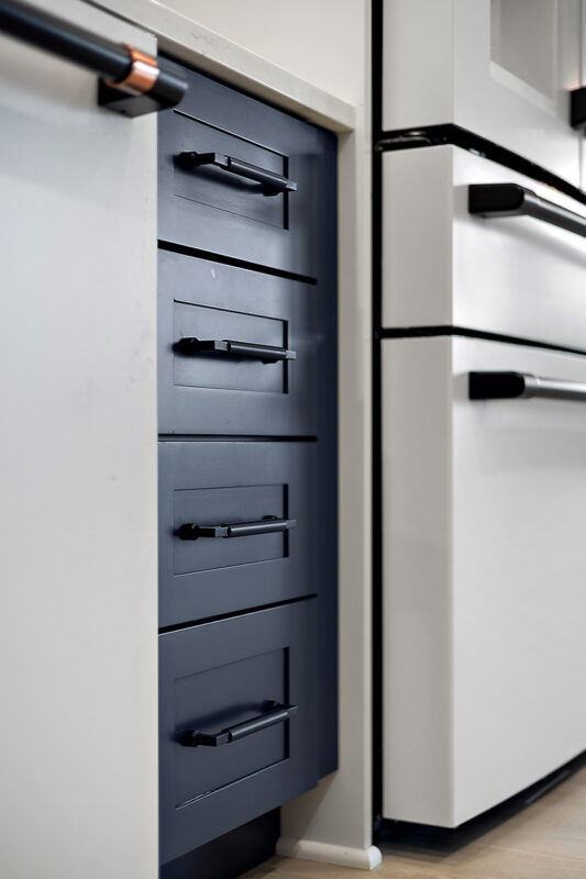 Blue and white painted kitchen cabinets