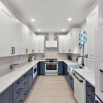 Blue and white painted kitchen cabinets