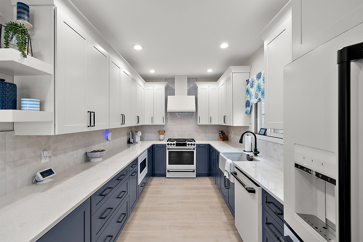 Blue and white painted kitchen cabinets