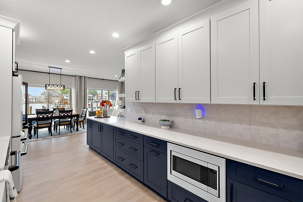 Blue and white painted kitchen cabinets