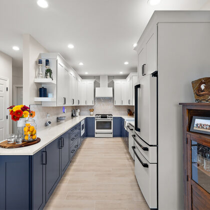 Blue and white painted kitchen cabinets