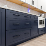 Blue and white painted kitchen cabinets