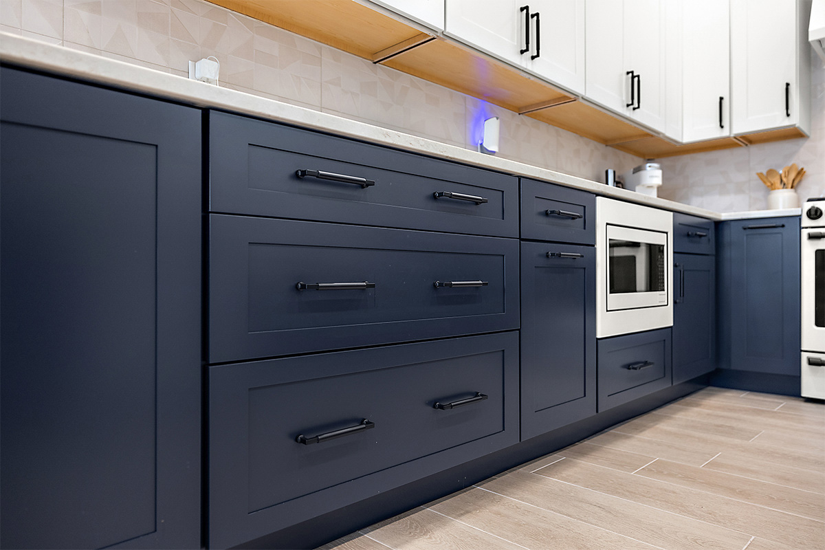 Blue and white painted kitchen cabinets
