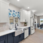 Blue and white painted kitchen cabinets