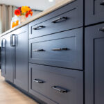 Blue and white painted kitchen cabinets