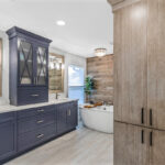 Blue bathroom vanity with Bamboo accent linen cabinet