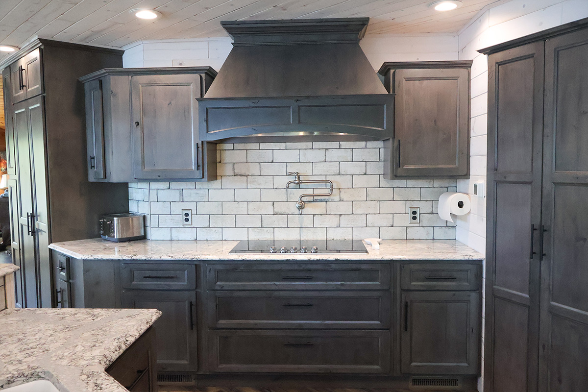 Dark stained kitchen cabinets