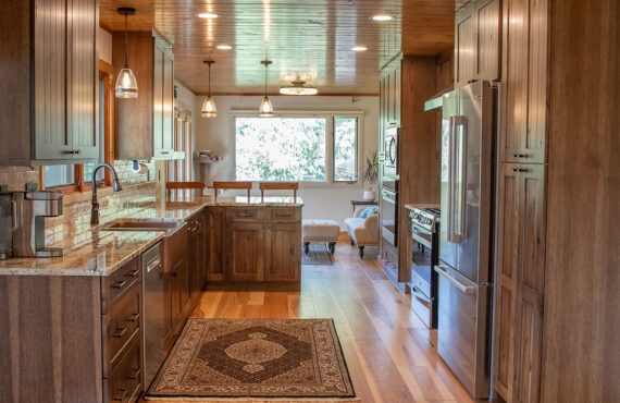Rustic hickory kithen cabinets with brown stain