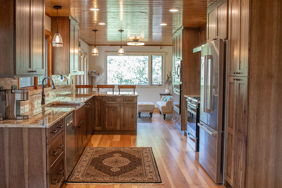 Rustic hickory kithen cabinets with brown stain